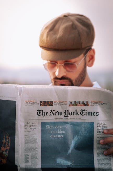 Editorial planning process on a desk with notes and laptop